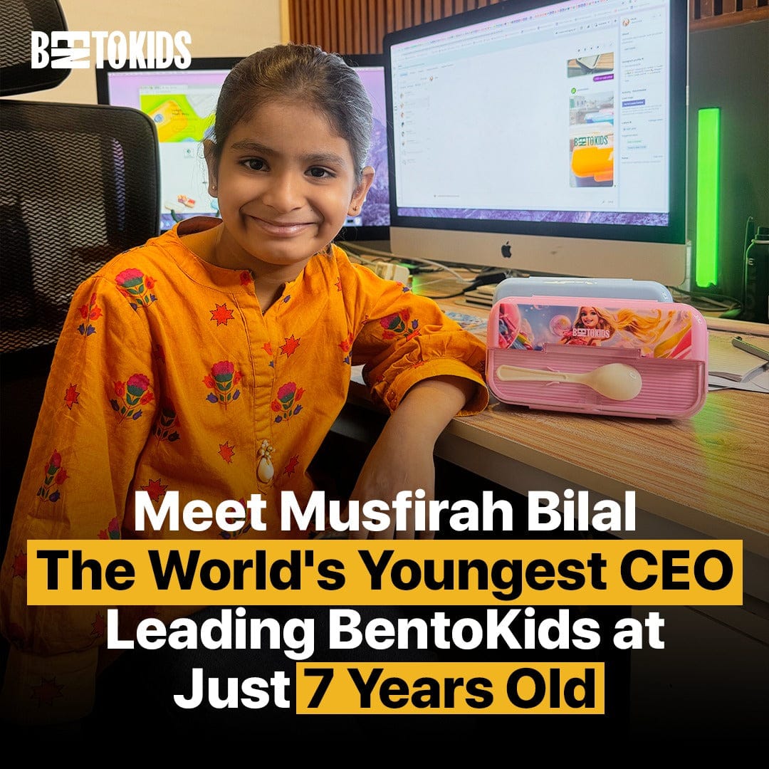 Musfira Bilal, labeled as 'The World's Youngest CEO,' smiling and sitting at a desk with two computer monitors and a pink Bentokids lunch box. Text highlights her leading Bentokids at just 7 years old.